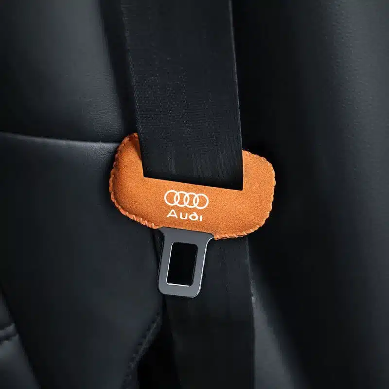 Audi Seat Belt Buckle Cover — Set of 2 1 Audi seat belt buckle cover installed on buckle stalk showing Audi logo